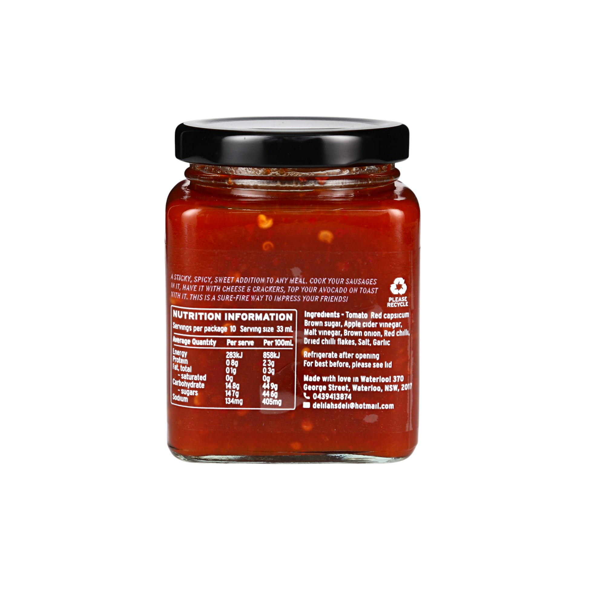 Jar of red sauce with nutrition information label on a white background